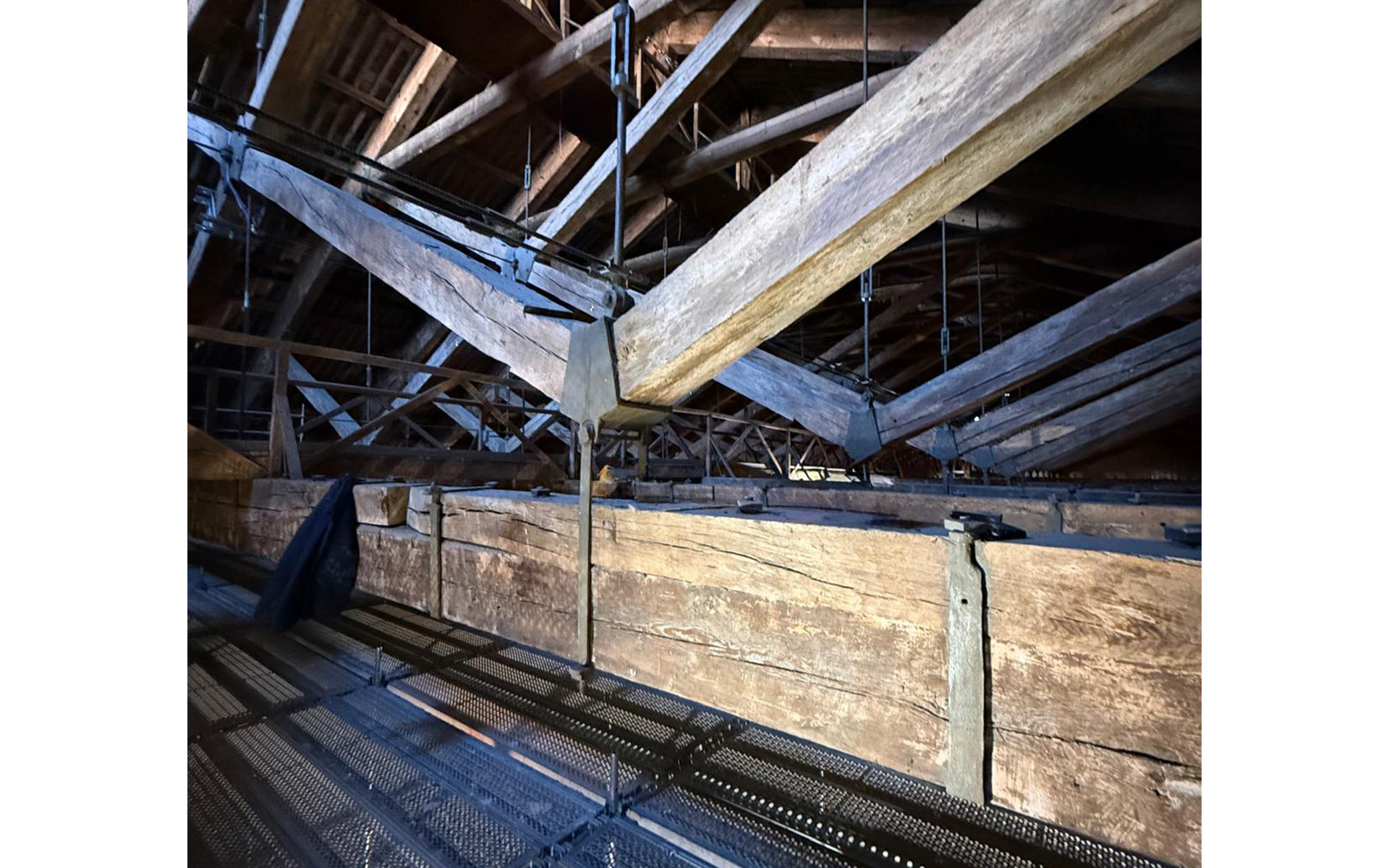Rothoblaas VGS full-thread structural screws applied to timber beam reinforcement in a heritage restoration project — countersunk head version for flush, discreet installation.